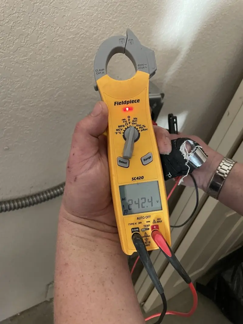 Voltage testing with clamp meter during Circuit Breaker Repair in Bowie